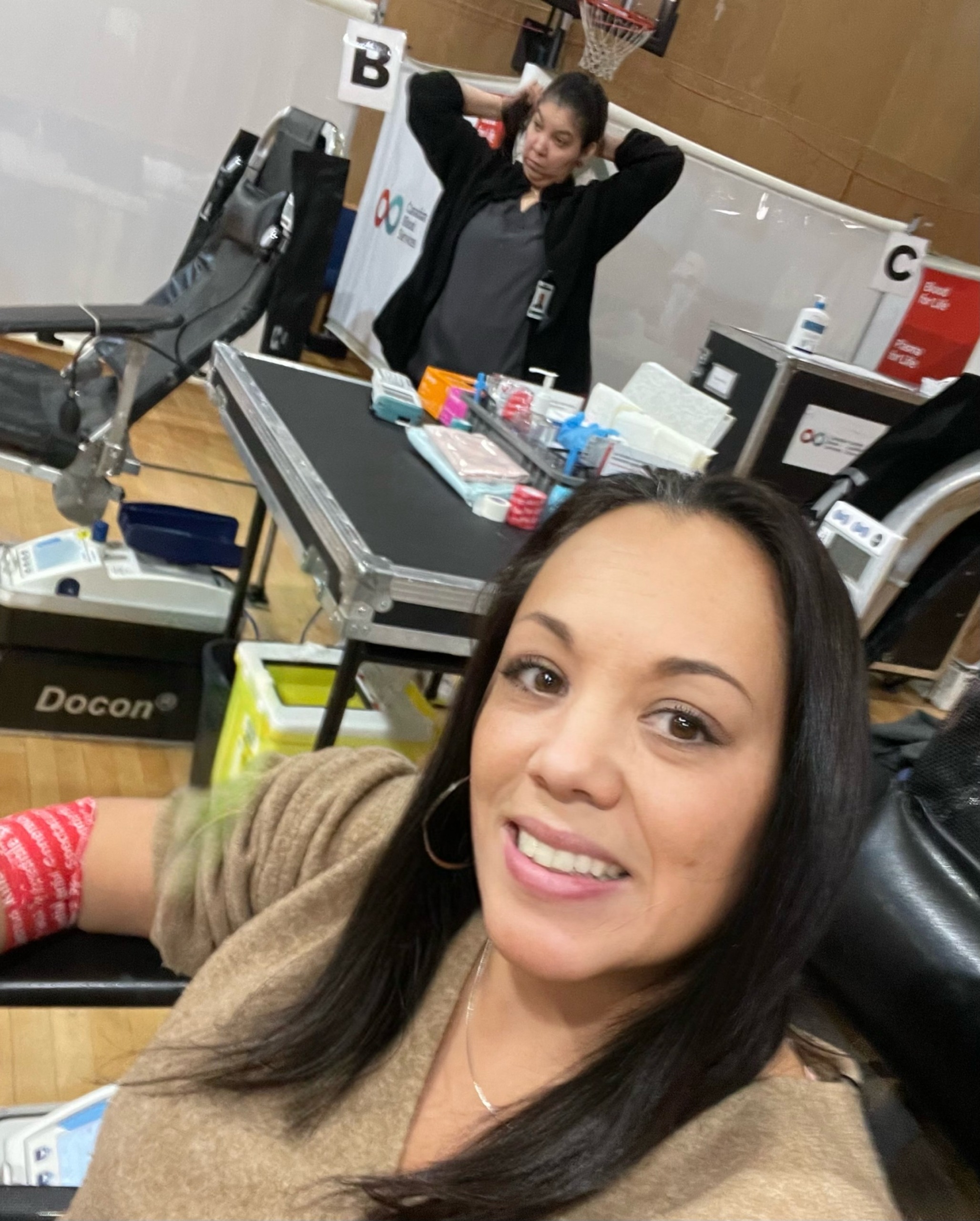 BC Mortgage broker Megan Chow donating blood for RACK'd 2024 Day 16 Blood Drive