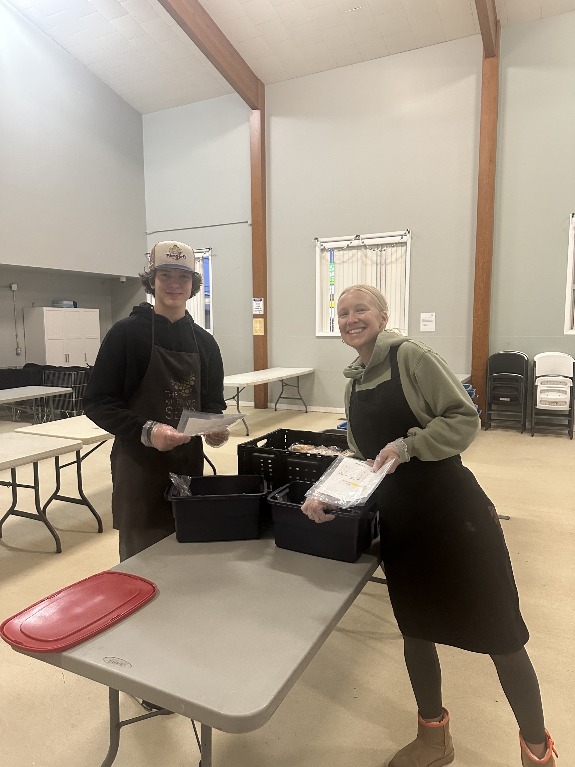 The Place To Mortgage team making lunches at the Red Deer Mustard Seed